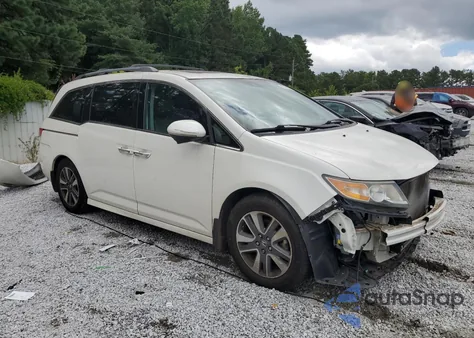 2014 Honda Odyssey Touring z USA, uszkodzony, nr VIN 5FNRL5H90EB109422